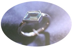 Fantazi platinum and emerald engagement ring by Xing Design